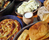 Homemade cheese, cream, milk and bread